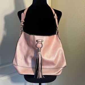 Pretty Pink Lulu Dharma hobo purse bag with long tassel.